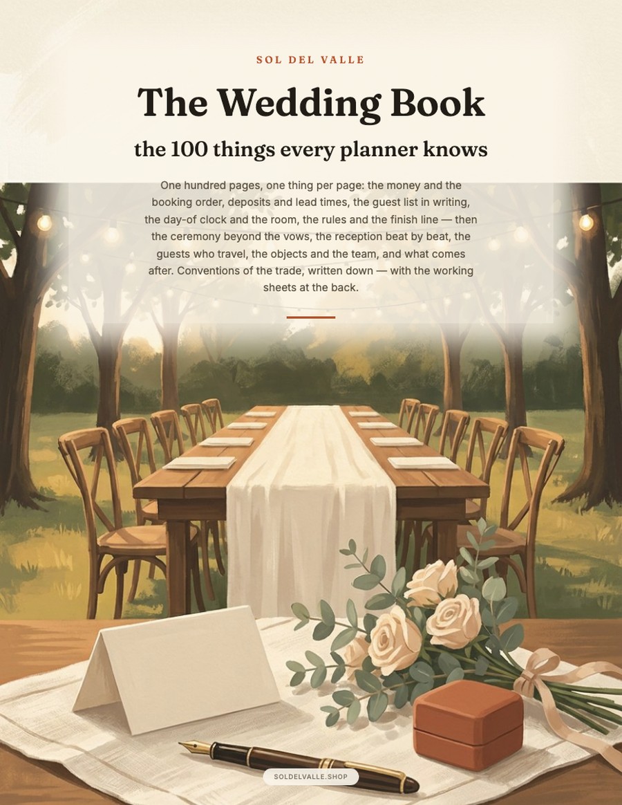 The cover of The Wedding Book, showing the title over an outdoor reception table set with string lights, a place card, a pen, ivory roses and a small ring box